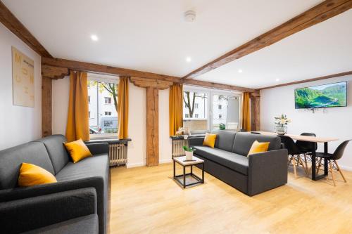 Area soggiorno di Homaris Apartments München Laim