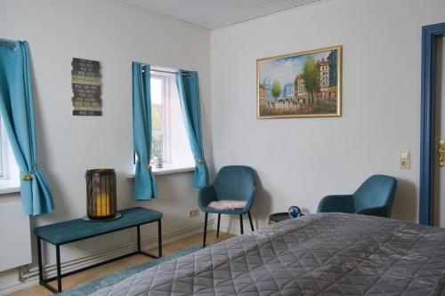 Ένα ή περισσότερα κρεβάτια σε δωμάτιο στο Ferienhaus Auszeit auf dem Berghof