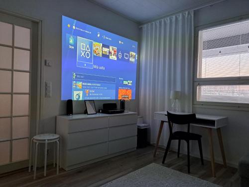 TV a/nebo společenská místnost v ubytování Nordic Villa