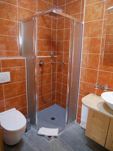 Salle de bains dans l'établissement Between Boutique Hotel