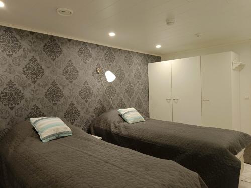 Ένα ή περισσότερα κρεβάτια σε δωμάτιο στο Taivalviiri