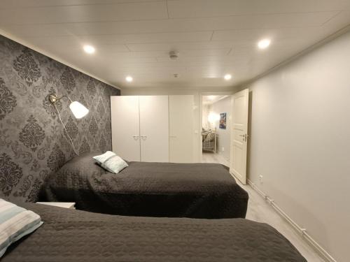 Un pat sau paturi într-o cameră la Taivalviiri