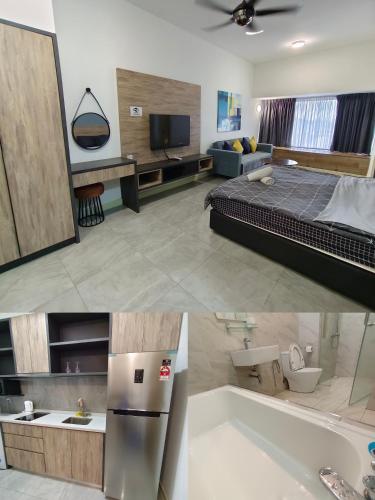 a living room with a bed and a bath tub at Imperio Homestay Private Bathtub Melaka Town - Near JONKER STREET in Melaka