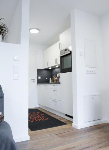 Η κουζίνα ή μικρή κουζίνα στο AD1716 Apartments