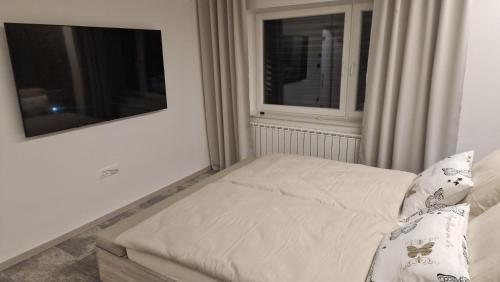 Apartmaji PR' KERINにあるベッド