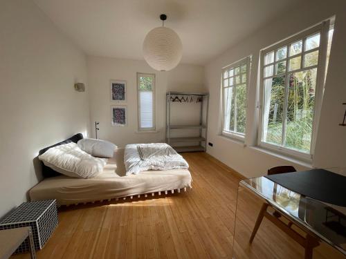 Postel nebo postele na pokoji v ubytování Dein Zuhause auf Rügen