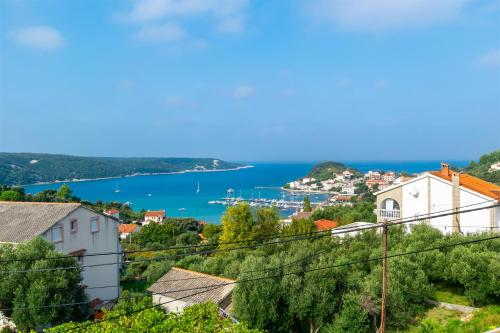 a town with a view of the water at Apartments Antonija in Kampor