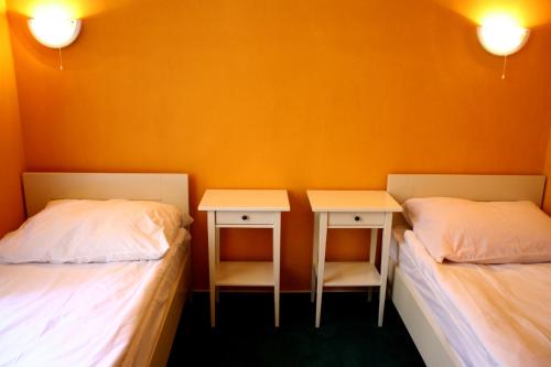 Letto o letti in una camera di Hotelové Pokoje Kolčavka
