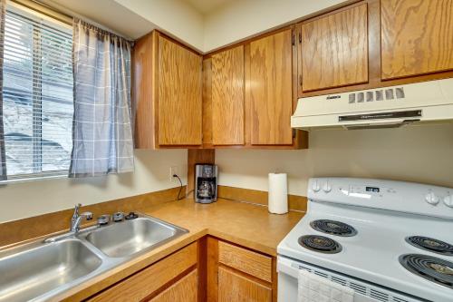 a kitchen with a sink and a stove at Lewiston Vacation Rental with Nearby River Access! in Lewiston