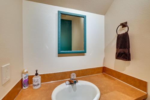 a bathroom with a sink and a mirror at Lewiston Vacation Rental with Nearby River Access! in Lewiston
