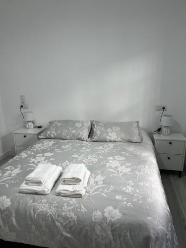 Tempat tidur dalam kamar di Ataraxia Casa Vacacional