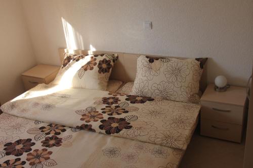 Postel nebo postele na pokoji v ubytování Apartments Miletic J-I