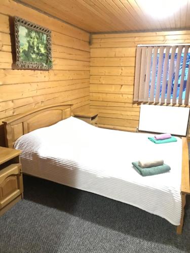 Postel nebo postele na pokoji v ubytování Trembita готель