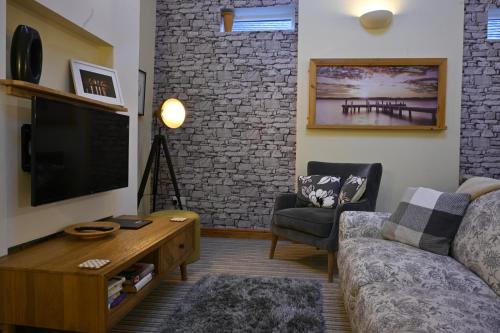 Μια τηλεόραση ή/και κέντρο ψυχαγωγίας στο The Little Pheasant Apartment Ironbridge Gorge