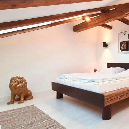 Ένα ή περισσότερα κρεβάτια σε δωμάτιο στο Löwe Apartments