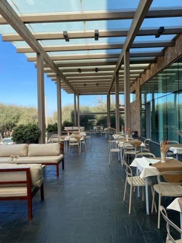 Restoran atau tempat lain untuk makan di Orfeo Suites Hotel Sierras Chicas