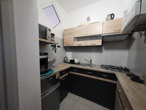 Кухня или мини-кухня в Apartament pod Basztą

