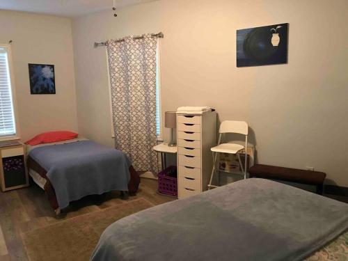 a hospital room with two beds and a window at CLARENDON,SUPRLOCATION,8ppl,PRIVATE,METRO,PARK in Arlington