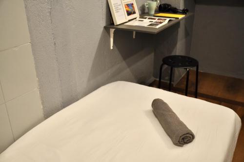 a roll ofoss at GRAYHAUS Guest House in Petaling Jaya