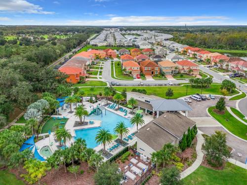 an aerial view of a resort with a pool at Tranquility Hut, Spacious 4-bedrooms, 4-bathrooms, Pools, free parking in Kissimmee