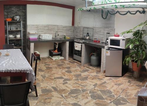 Η κουζίνα ή μικρή κουζίνα στο Casa 1er piso D&C
