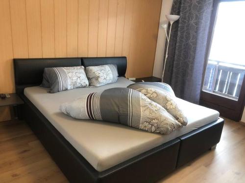 מיטה או מיטות בחדר ב-Haus Bergfriede 4