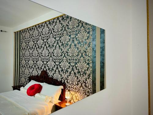 Łóżko lub łóżka w pokoju w obiekcie Venice VIP Guest House