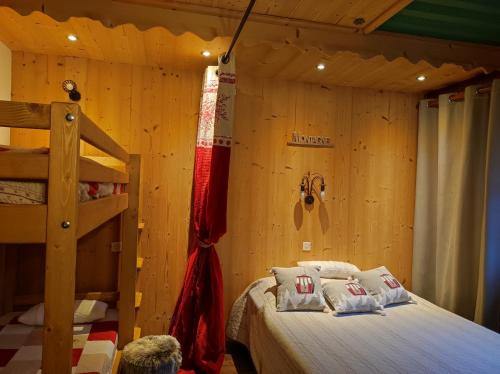 Ένα ή περισσότερα κρεβάτια σε δωμάτιο στο Chalet Mon Idole