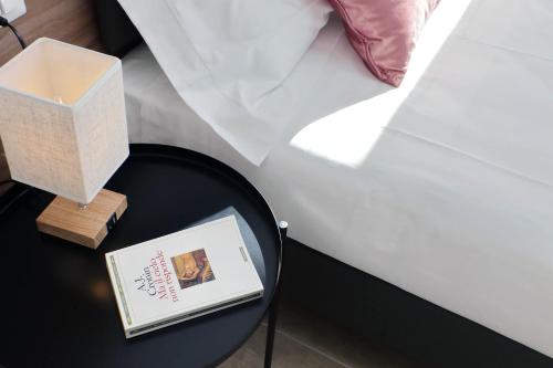 Letto o letti in una camera di Siena Hills Apartments