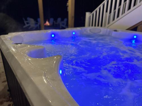 a jacuzzi tub with blue lights in it at The Ephraim House in Ephraim