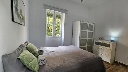 Posteľ alebo postele v izbe v ubytovaní Malaga Home