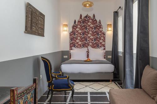 Postel nebo postele na pokoji v ubytování Riad la Parenthèse by Sashema