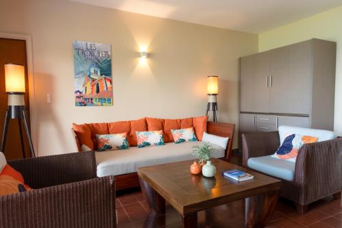Un lugar para sentarse en Emeraude Villas - Bay