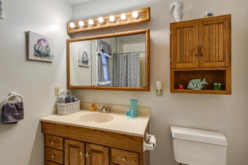 a bathroom with a sink and a mirror at Pet-Friendly Nashville Home about 4 Mi to Airport! in Nashville