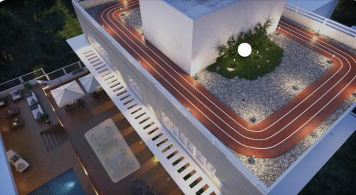 an overhead view of a building with a road at JRVII in Santo Domingo