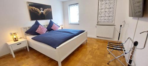 Katil atau katil-katil dalam bilik di FeelHome Ferienwohnung Tuttlingen