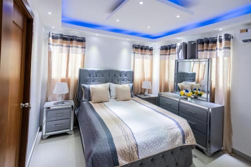 Postel nebo postele na pokoji v ubytování Breezes by TECASA