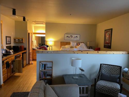 a living room with a couch and a bed at BOATYARRD Inn # 9 in Langley
