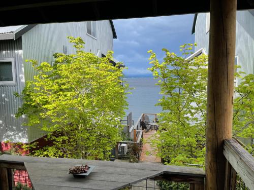 a view of the ocean from the balcony of a house at BOATYARRD Inn # 9 in Langley