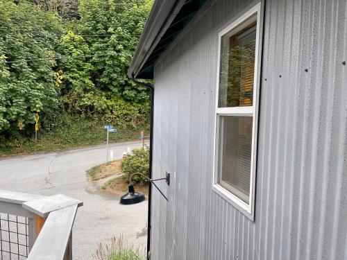 an open door of a house with a window at BOATYARRD Inn # 9 in Langley