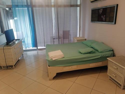 Postel nebo postele na pokoji v ubytování Residencial turisco albatros mal azul