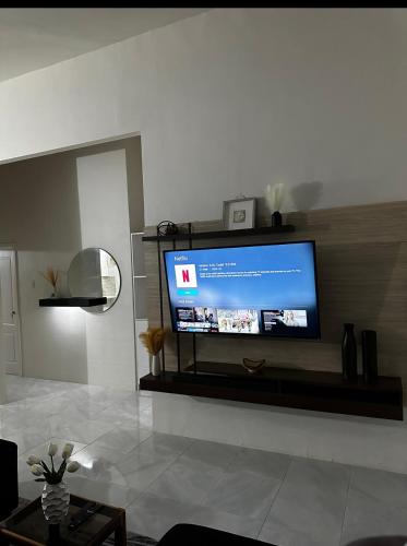 A television and/or entertainment centre at JustFun Home, Discovery Bay, St Ann Jamaica