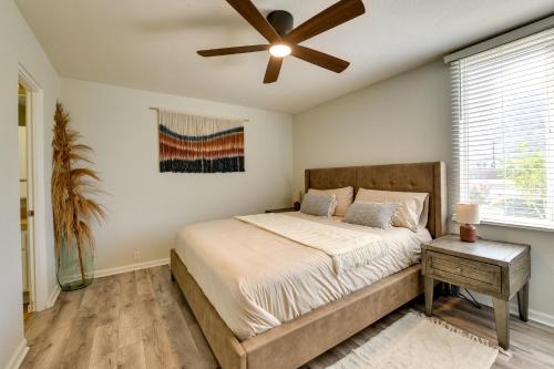 a bedroom with a bed and a ceiling fan at Private Patio, Community Perks Palm Springs Condo in Palm Springs