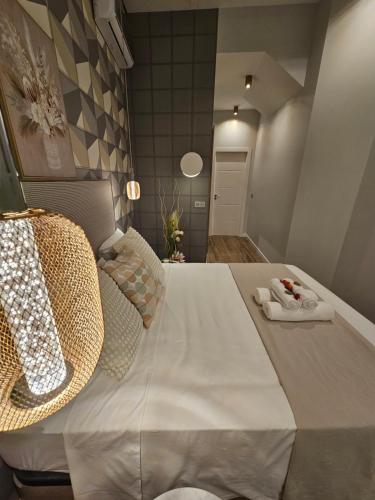 a bedroom with a large bed in a room at Lounge garden sea relax in Valencia