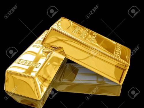 a pile of gold bars on a black background stock photo at Le rocher de l'Ile in Nantes