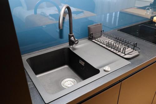 Kuchyň nebo kuchyňský kout v ubytování Once apartments