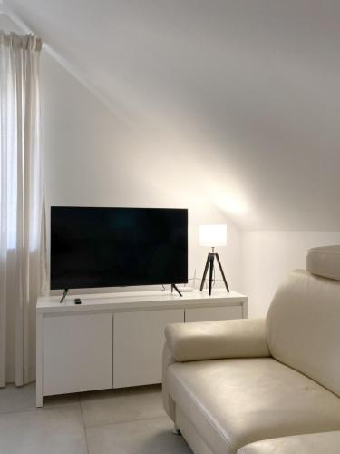 TV a/nebo společenská místnost v ubytování The View 22