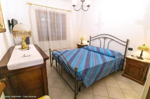 En eller flere senge i et værelse på Vento Mare Palau