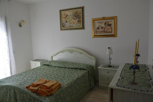 Giardini Di Fraicu tesisinde bir odada yatak veya yataklar