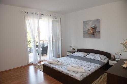 Posteľ alebo postele v izbe v ubytovaní Holiday house with a parking space Podstrana, Split - 6044